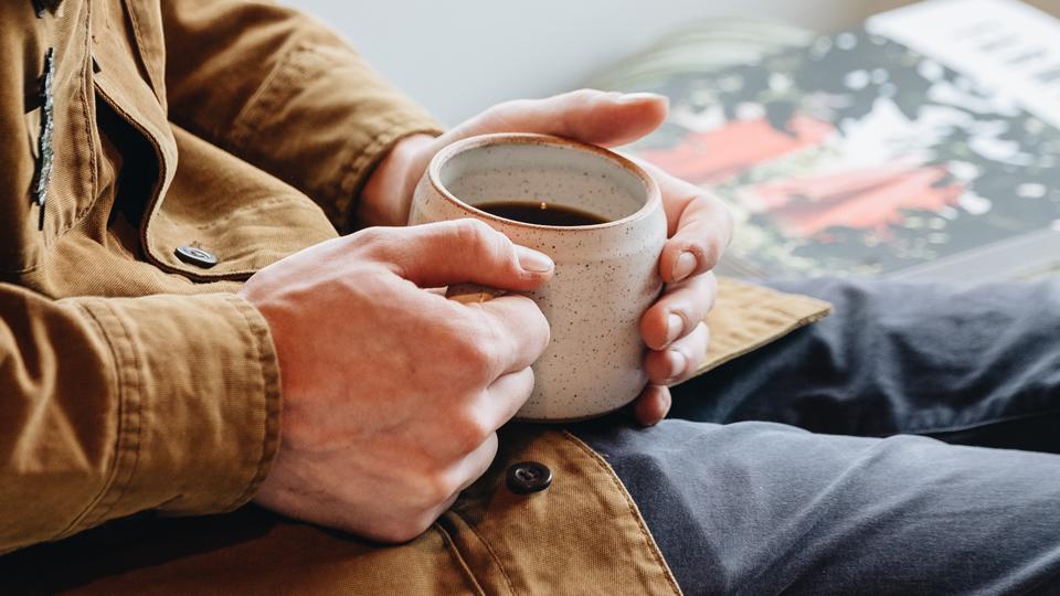 enjoying a cup of holiday blend