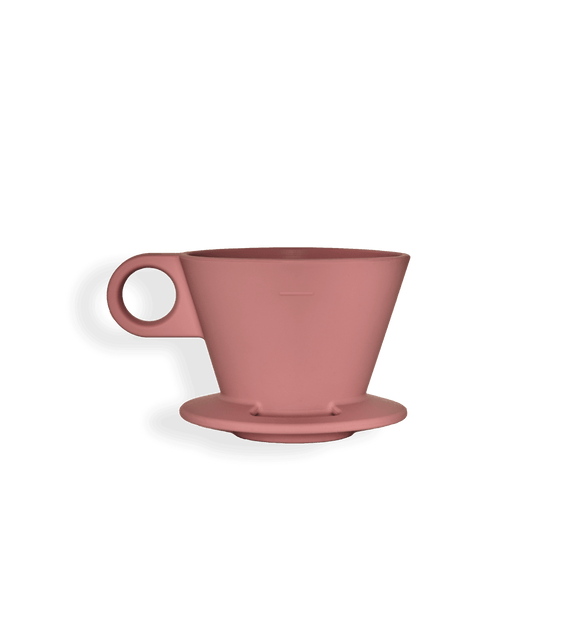 a pink coffee cup with a handle