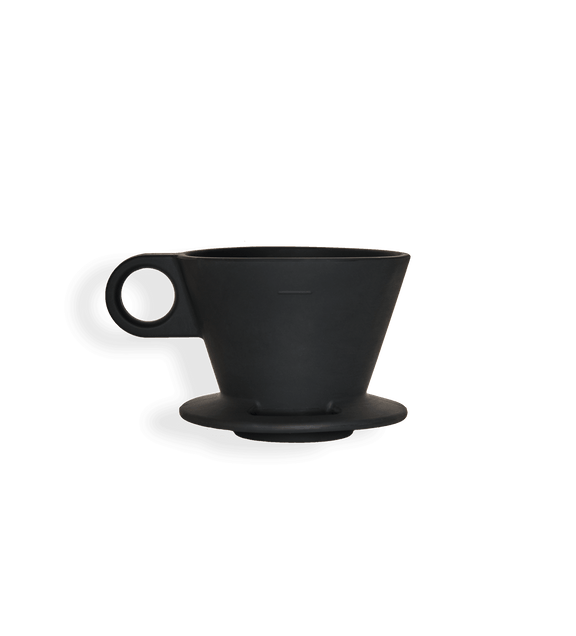 a black coffee cup with a handle