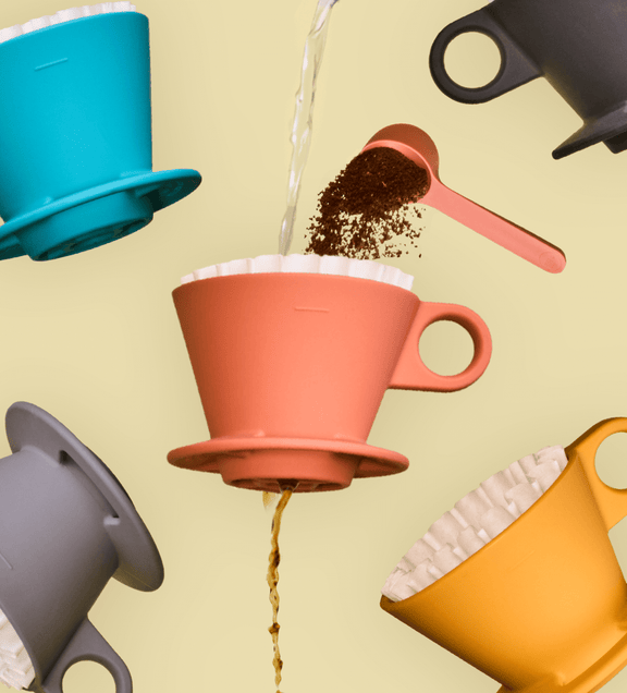 a coffee being poured into a coffee filter